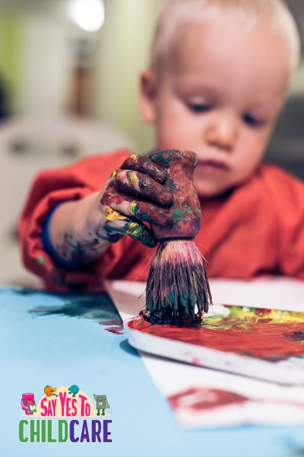 toddler mixing colors